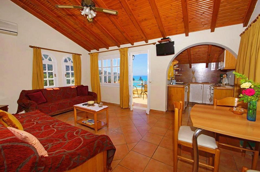 Apartment C - open kitchen with dining area and living room